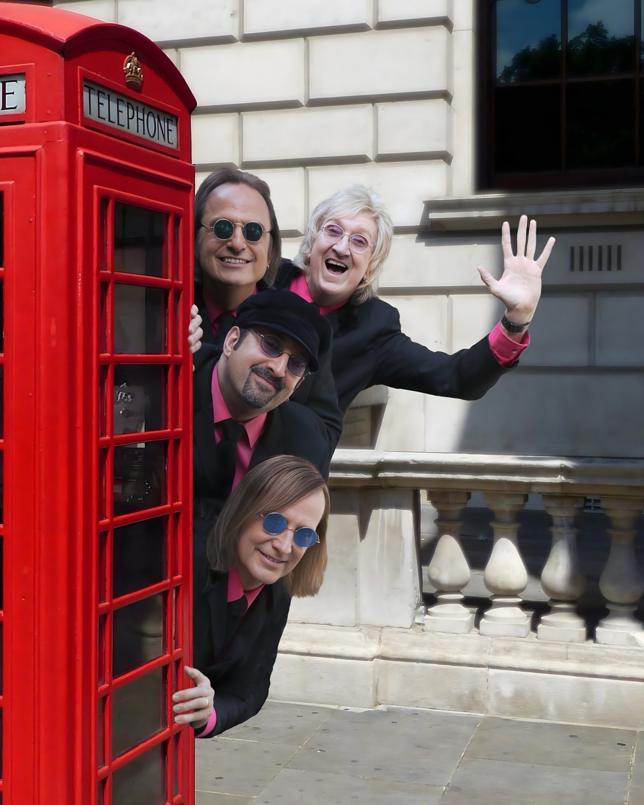 The British Invasion Years posing by a London phone booth