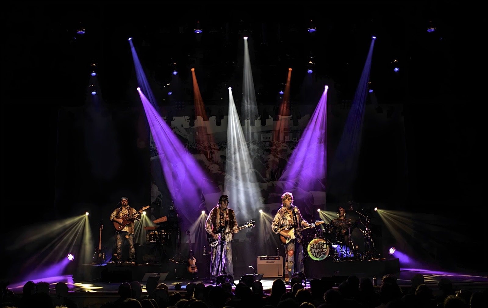 The British Invasion Years in 60s fringe outfits on stage
