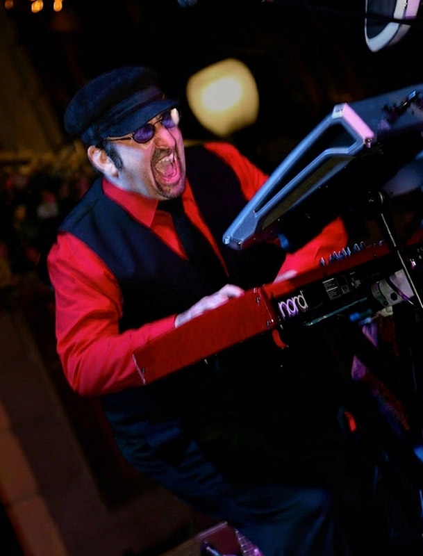 Jon Wolf, keys, guitar and vocals